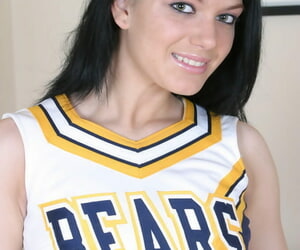 Dark haired cheerleader Roxy..